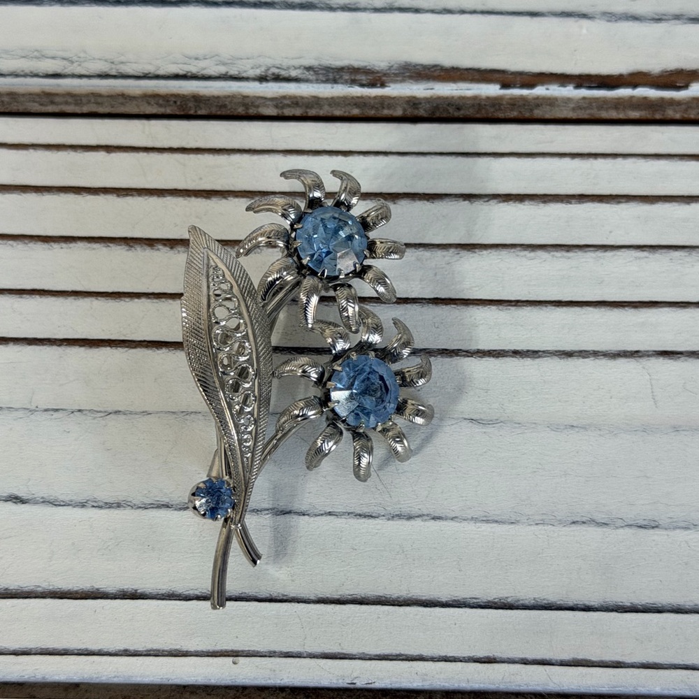 Elegant Silver and Blue Floral Brooch